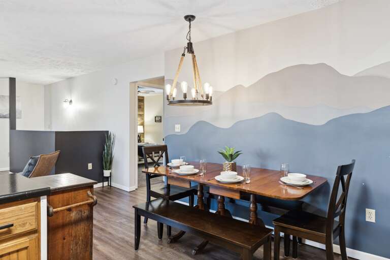 Elevate your dining experience with the warm glow of our unique chandelier 