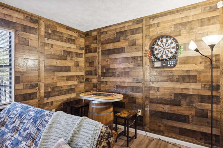 Bulls-eye!! Our game room is complete with a dartboard for endless fun.