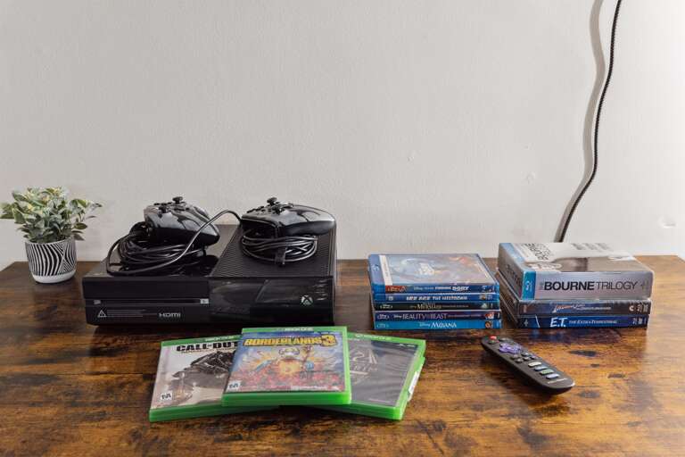 Xbox, Xbox games, and TONS of DVDs   (find the rest of the DVDs in the king room around the corner)