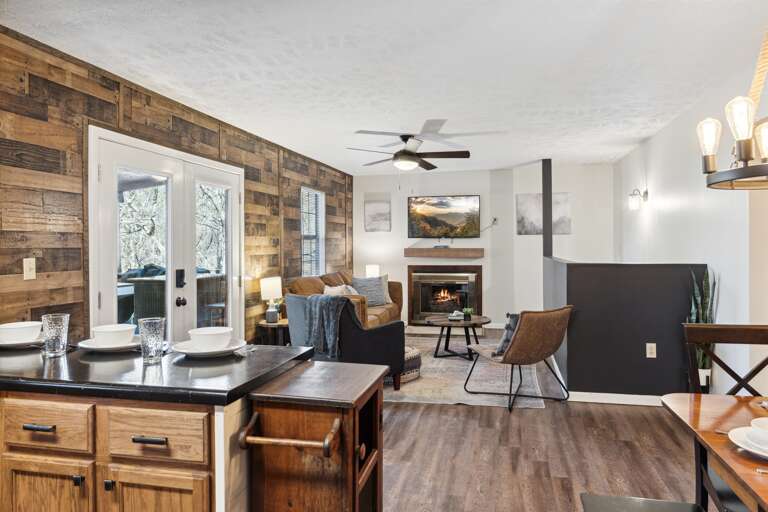 The heart of the home: Where delicious meals meet entertainment in our open kitchen-living space.  We even have a smart TV with all of your favorite subscription services.  *please note that the fireplace is not working for guests*