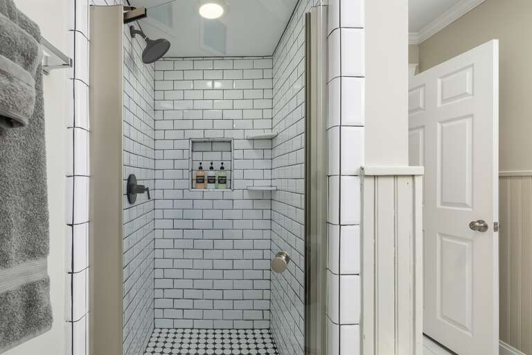 Beautiful walk in shower with ample space for a truly rejuvenating and luxurious bathing experience. 