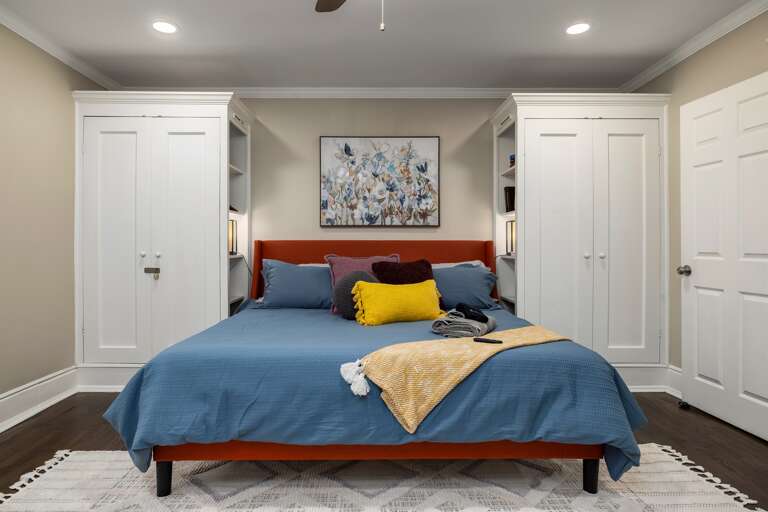 Welcome to your personal oasis: The front view of the king suite exudes a cozy and vibrant charm, inviting guests into a space where comfort meets style, ensuring an exquisite stay from the very first glance.