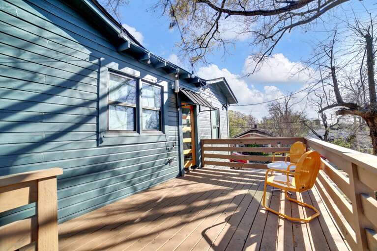 **Patio Pleasures**: A different angle of the back patio showcases the space’s inviting atmosphere for relaxation or entertainment.