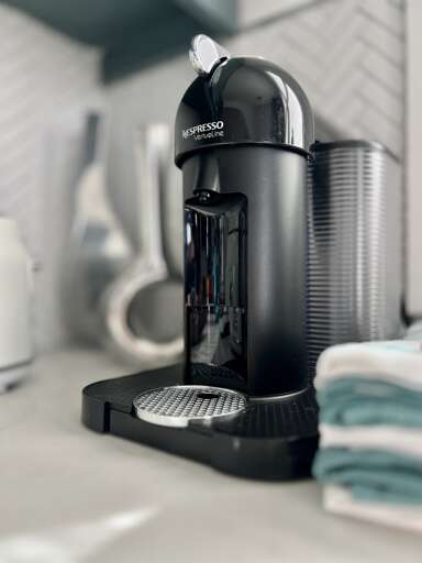 A close-up of the espresso machine invites coffee lovers to indulge in their favorite brews.