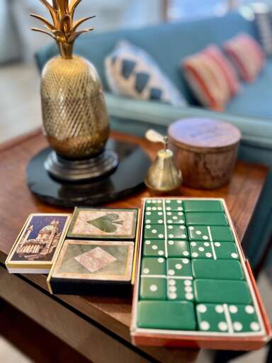 **Fun and Games**: Highlighting available games like cards and dominoes, this photo promises enjoyable moments for your stay at the property.