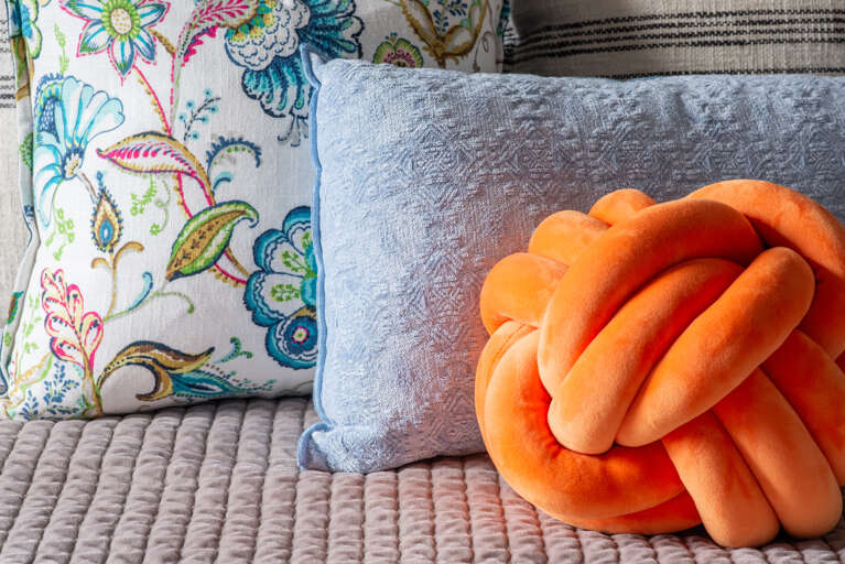 Immerse in the subtle elegance of our carefully selected bed pillows, ensuring a restful night's sleep.