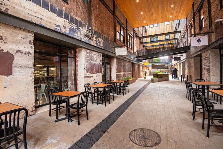 Step into the vibrant life below with our downstairs common spaces, surrounded by enticing restaurants right at your doorstep.