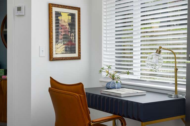 Embrace productivity in a workspace designed with inspiration in mind, overlooking a window that floods the area with beautiful natural light.