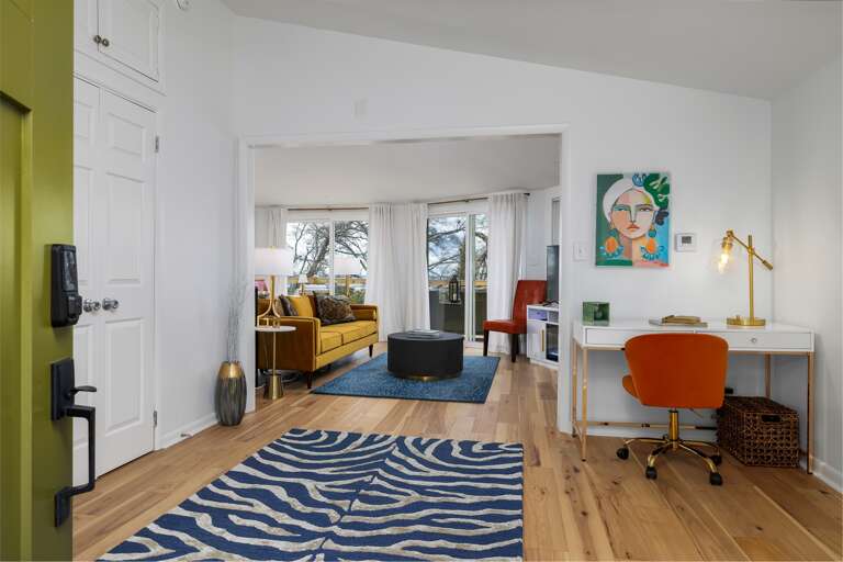 Step upstairs to a world of creativity: an entry leading to a cozy office space, where every corner is designed to inspire thoughts and dreams.