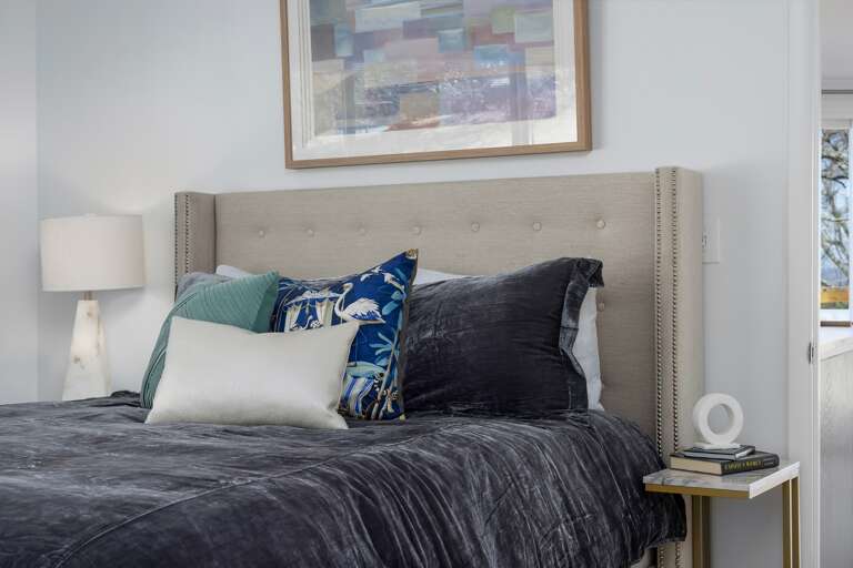 Indulge in the upstairs bedroom, where velvet bedding whispers luxury. Reach out to us for our personalized concierge services and handpicked local experiences. 