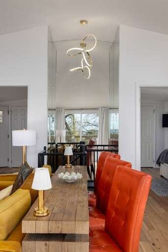 Cozy yet chic, the three-seat dining area offers an intimate setting for memorable meals, perfectly blending form and function.