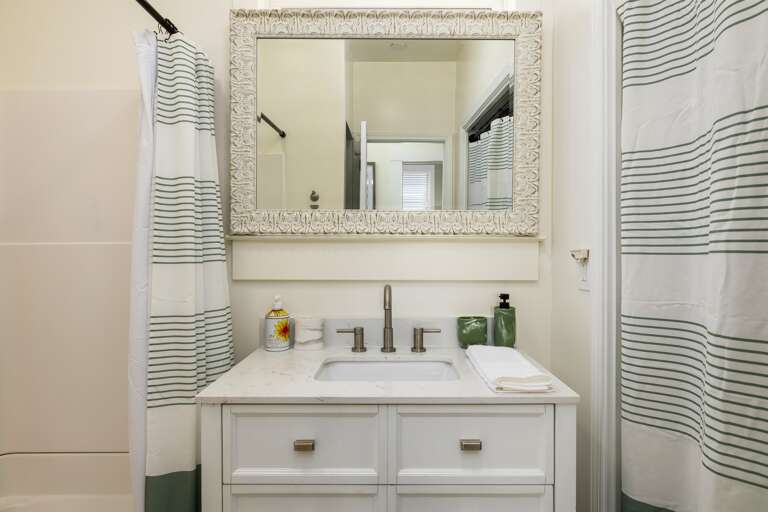 Another perspective of the bathroom highlights its stylish fixtures and well-maintained amenities, ensuring a comfortable experience. 