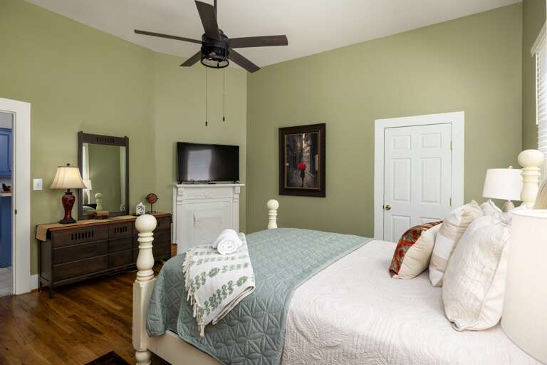 The queen bedroom includes a smart TV, allowing guests to unwind with their favorite shows in the comfort of their room.