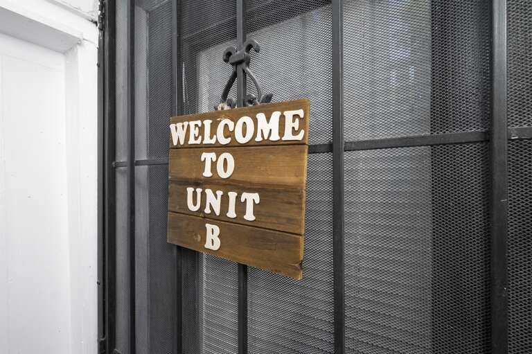 Step inside Unit B, greeted by a warm and inviting atmosphere.