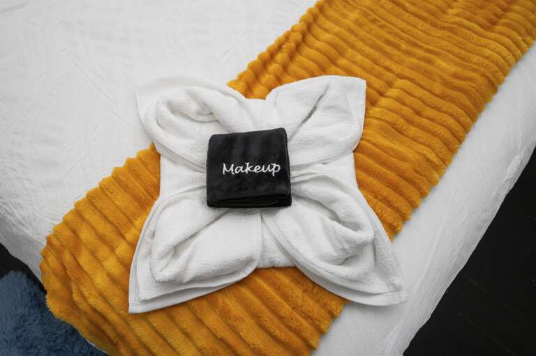 Thoughtfully selected amenities like makeup towels for added convenience.