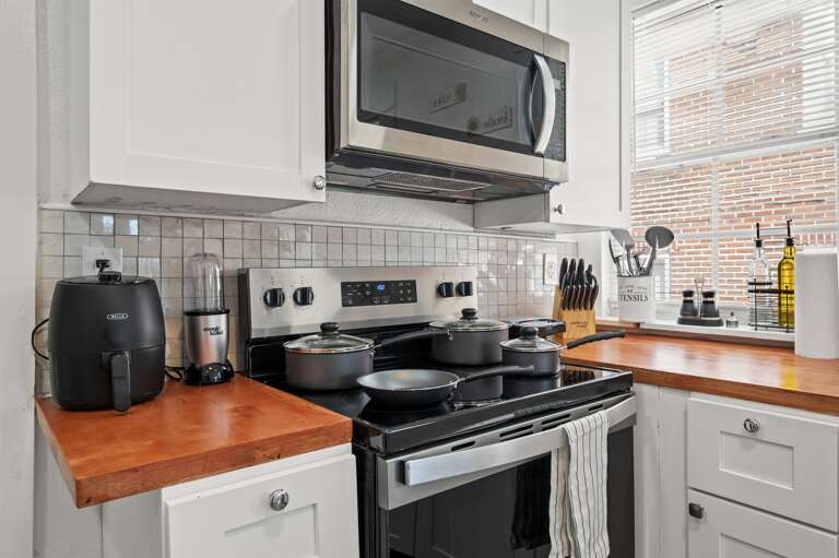 Spacious, fully equipped kitchen, providing everything you need for a delightful cooking experience.