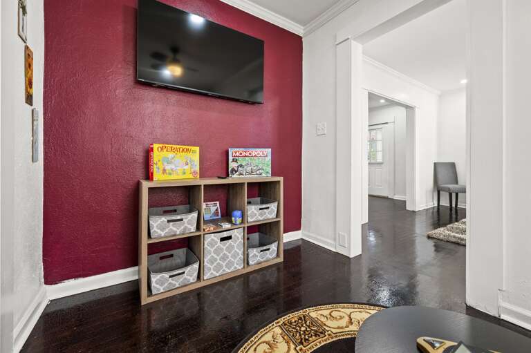 Game Room seamlessly connects to the dining room and the kitchen.  Let the kids be entertained in the game room with a Wii console, board games, books, and cozy beanbags. Game Room seamlessly connects to the dining room and the kitchen.  Let the kids be entertained in the game room with a Wii console, board games, books, and cozy beanbags.