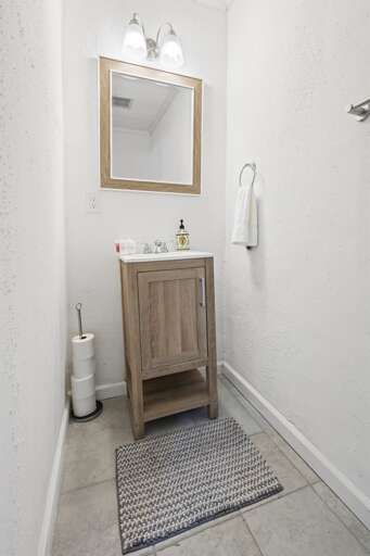 Half bath fully stocked with essential toiletries, including toilet paper for your convenience. Half bath fully stocked with essential toiletries, including toilet paper for your convenience.