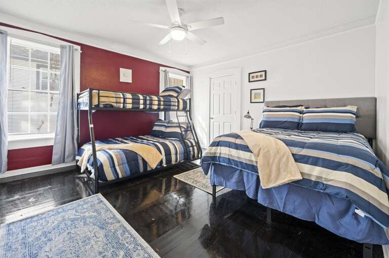Chill out in the cozy bunk room! With two full beds and a twin bed there is tons of room for everyone!! There is even a smart TV!! Chill out in the cozy bunk room! With two full beds and a twin bed there is tons of room for everyone!! There is even a smart TV!!