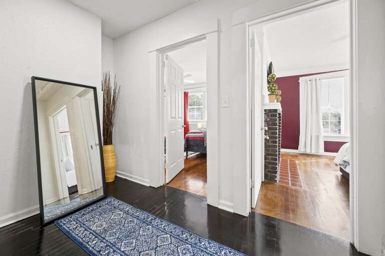 Hallway leading to the serene queen master bedroom and a cozy double full bed bedroom. Hallway leading to the serene queen master bedroom and a cozy double full bed bedroom.