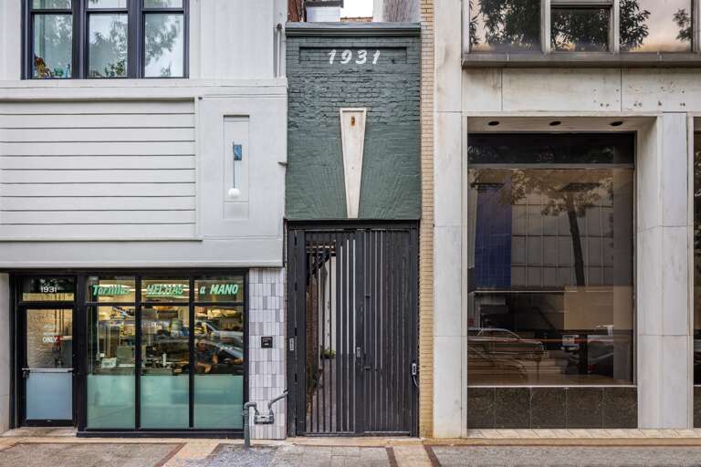 A secure gateway—guests enter through this sleek, black metal door, which leads to the private and contemporary comforts of your stay at 1931 2nd Avenue N.