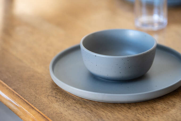 Elegant dining setup with simple, modern touches, perfect for a cozy meal. Elegant dining setup with simple, modern touches, perfect for a cozy meal.