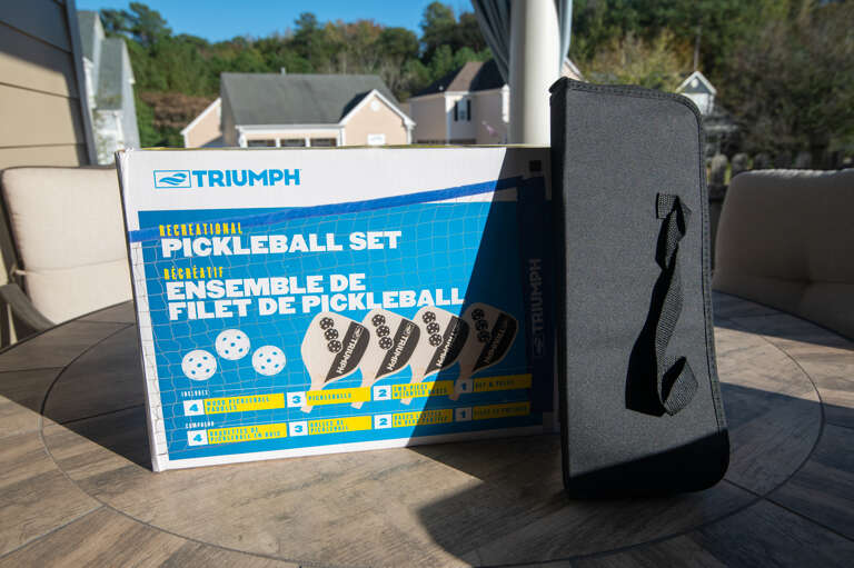 Outdoor fun awaits with a pickleball set, corn hole, and grilling utensils, perfect for group activities.  Outdoor fun awaits with a pickleball set, corn hole, and grilling utensils, perfect for group activities.