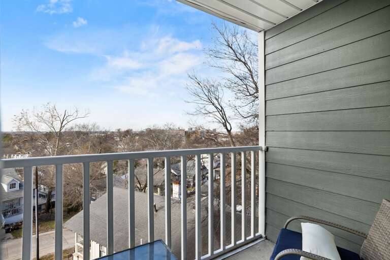 Private balcony with seating and scenic views, perfect for relaxing outdoors. Private balcony with seating and scenic views, perfect for relaxing outdoors.