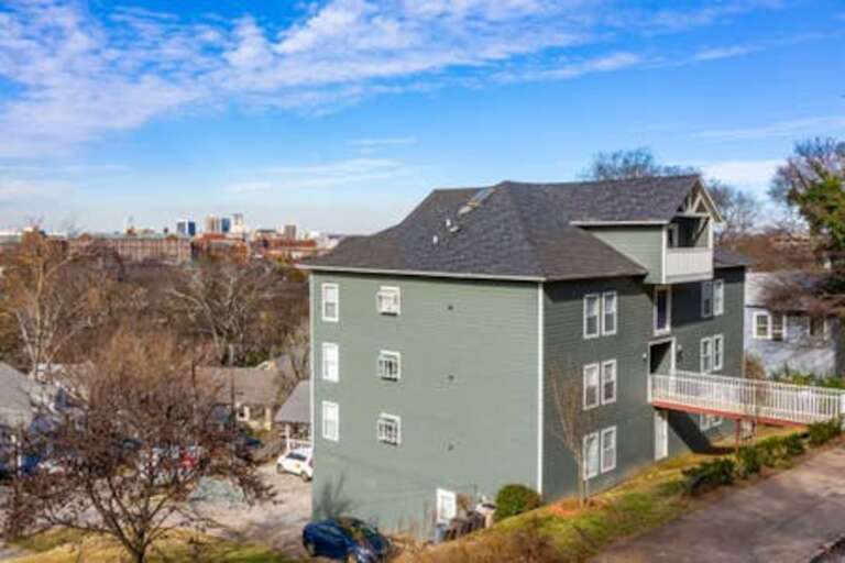 Scenic exterior of Hilltop Hideaway, located in Birmingham’s vibrant Southside.