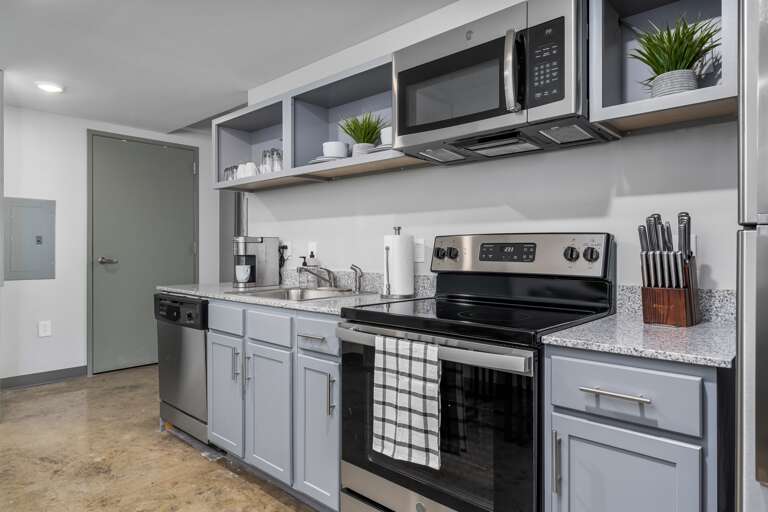 Fully equipped kitchen with contemporary finishes, perfect for preparing meals during your stay.
