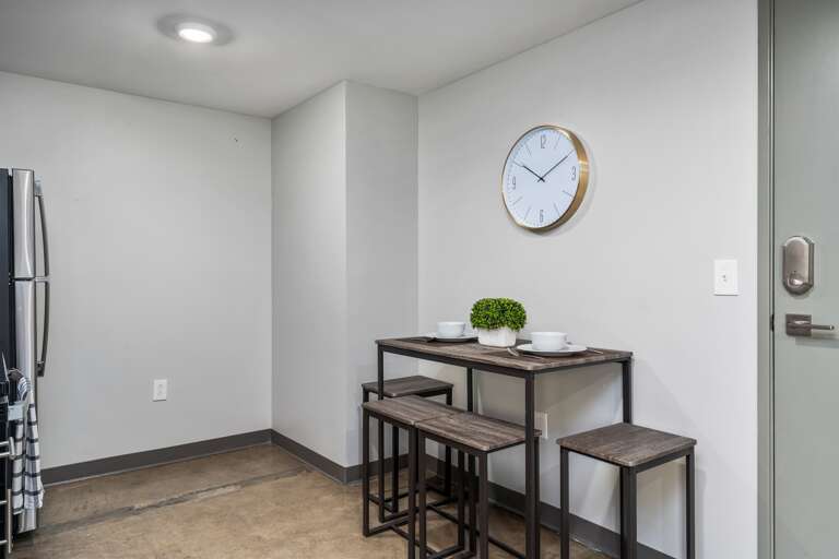 Contemporary kitchen featuring stylish fixtures and a welcoming dining space.