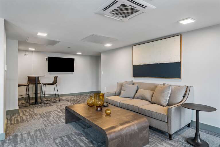 Inviting common area with stylish furniture and a welcoming atmosphere.