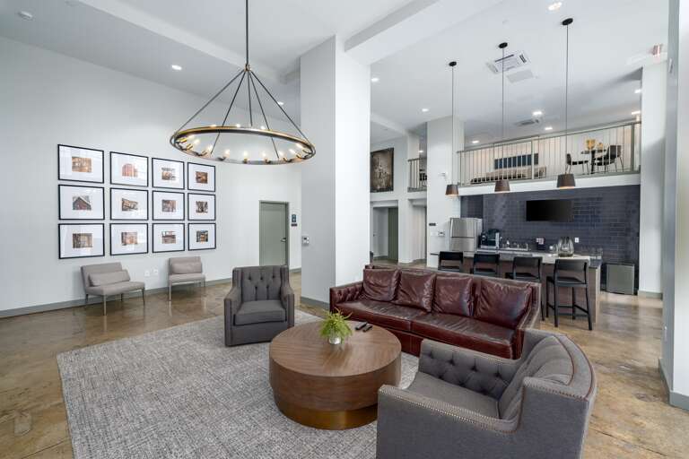 Stylish common lounge with chic furnishings and a welcoming atmosphere for guests to relax or socialize.