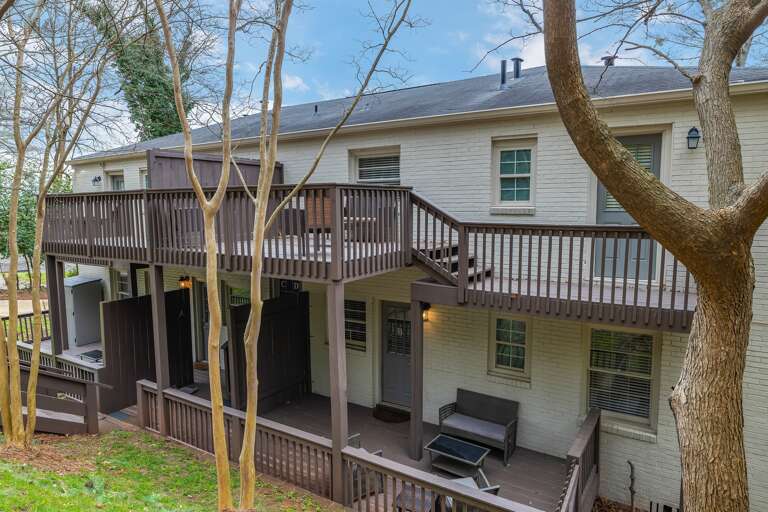 A closer look at the shared upper balcony, providing additional space to relax and take in the greenery.