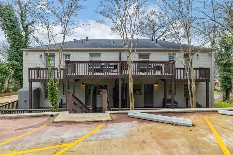 Each unit boasts its own private entrance and outdoor seating area, ideal for enjoying the fresh air and quiet surroundings.