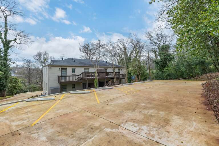 Ample parking is available behind the building, with 2 spaces for each unit to ensure guest convenience. Ample parking is available behind the building, with 2 spaces for each unit to ensure guest convenience.