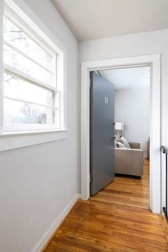 The hardwood floors and clean, modern finishes greet you as you enter Unit D, creating a stylish and inviting space. The hardwood floors and clean, modern finishes greet you as you enter Unit D, creating a stylish and inviting space.