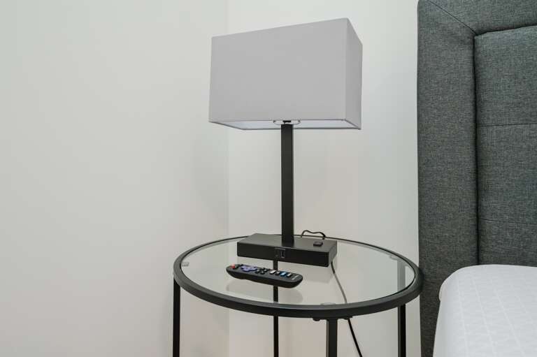 Close-up of bedside essentials, showcasing the thoughtful touches that make your stay special.