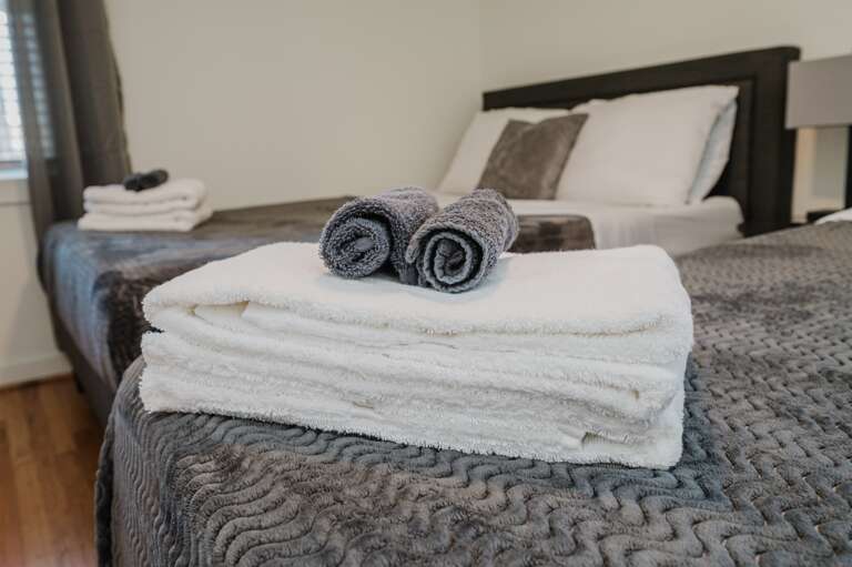 Sink into comfort each night in our inviting beds.