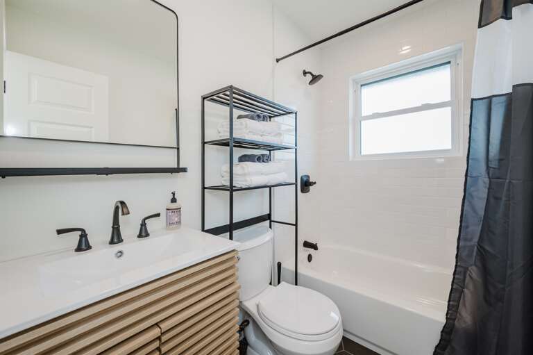 Sleek and stylish bathroom with contemporary fixtures and a clean design. Sleek and stylish bathroom with contemporary fixtures and a clean design.