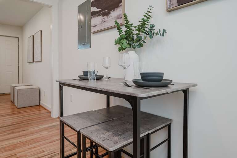 Contemporary dining space perfect for meals and gatherings, featuring stylish decor and seating for guests. Contemporary dining space perfect for meals and gatherings, featuring stylish decor and seating for guests.