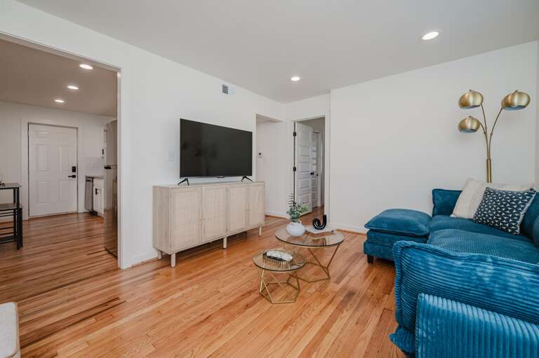 Open concept living and dining area, designed for comfort and convenience. Open concept living and dining area, designed for comfort and convenience.