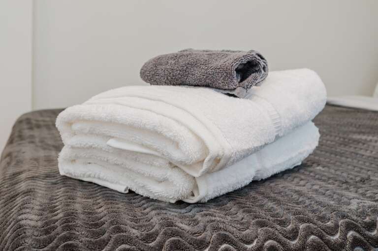Soft, high-quality towels provided to enhance your bathing experience. Soft, high-quality towels provided to enhance your bathing experience.