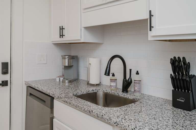 Full view of the stylish and functional kitchen, ready for any culinary challenge. Full view of the stylish and functional kitchen, ready for any culinary challenge.
