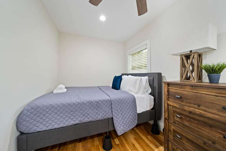 Similar to the primary, this bedroom offers comfortable bedding and a peaceful ambiance, ideal for relaxing after a day out.