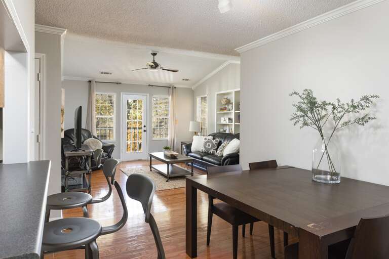 Dining and Living Space: A seamless flow between dining and living areas with a scenic view.