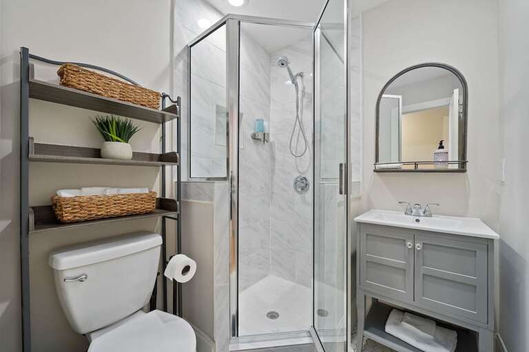 Features modern fixtures and a spacious vanity for your convenience.