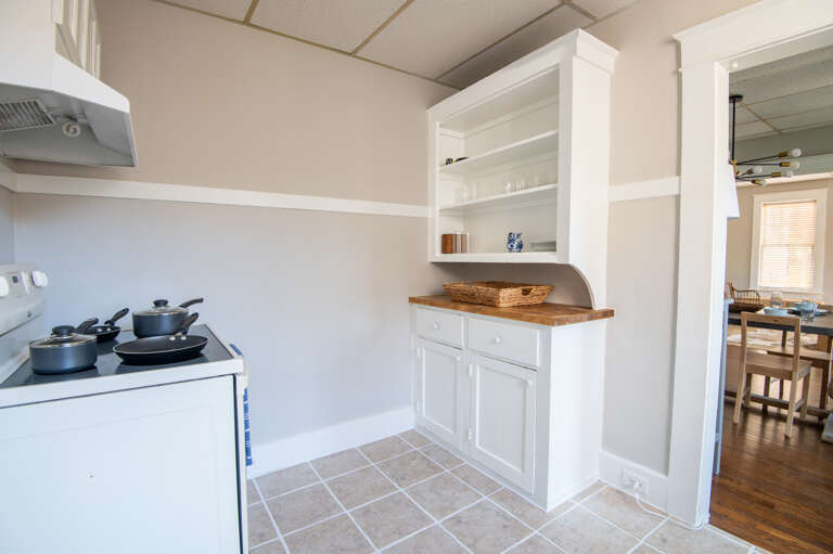 Compact kitchen corner optimized for functionality and style.