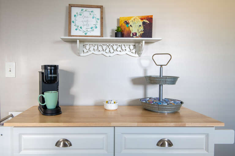 Convenient coffee and beverage station stocked with essentials for your morning routine Convenient coffee and beverage station stocked with essentials for your morning routine