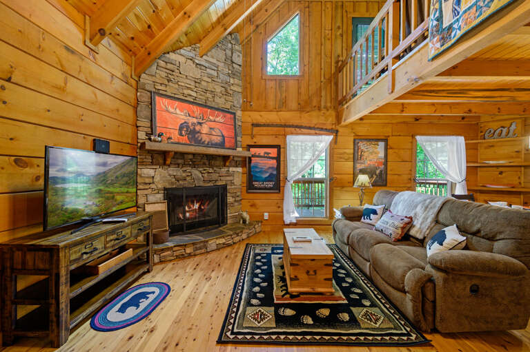 Living Area With Reclining Sofa, DirecTV, Fireplace